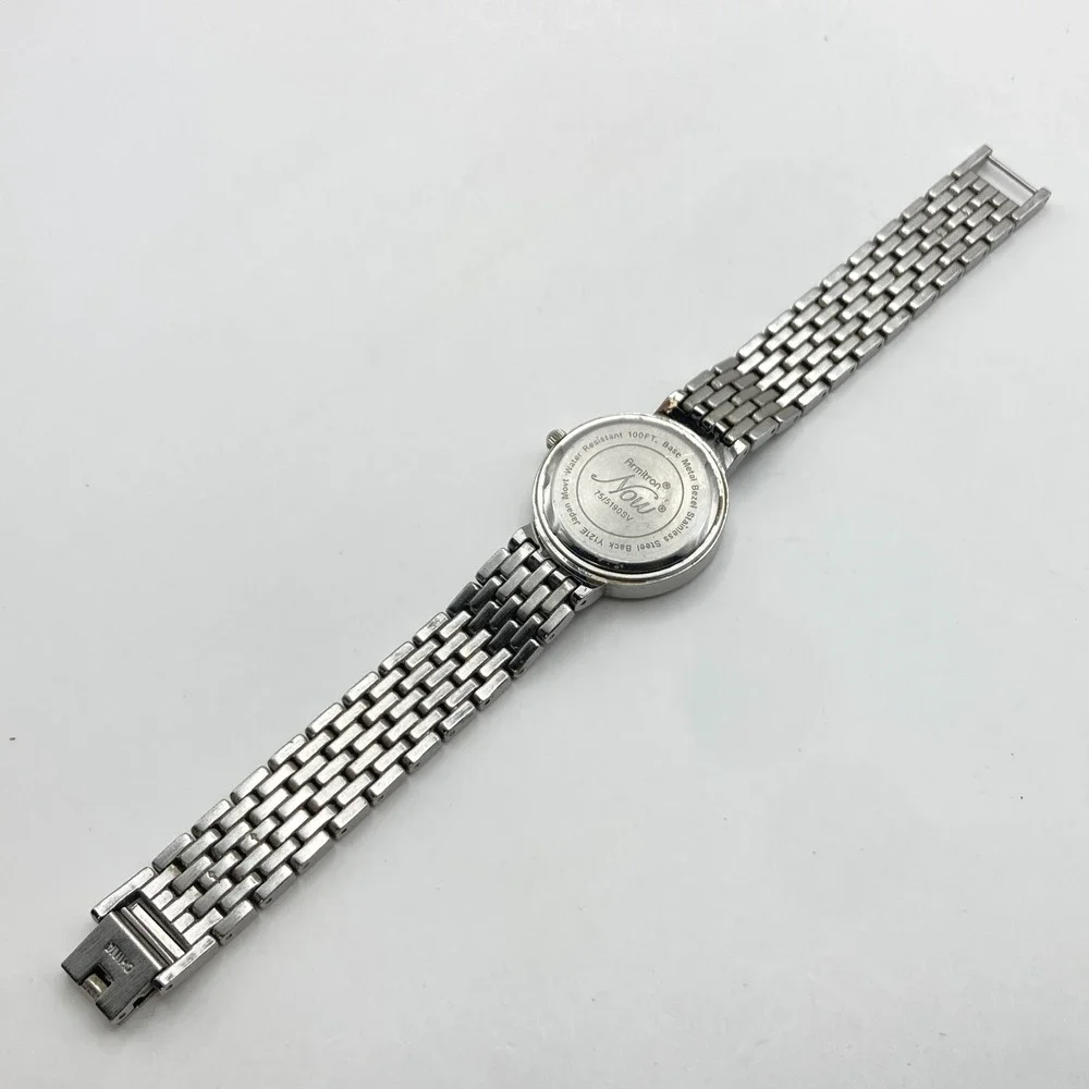 Armitron Now Women's Watch 28mm Silver Tone Crystals MOP Dial New Battery 6.75